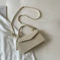 Chic beige woven texture square handbag with a gold buckle and knotted top handle - White