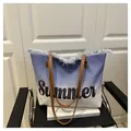 Detail of blue gradient canvas tote with Summer print and brown leather handles - Dark Blue