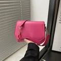 Vibrant pink faux leather crossbody bag with stylish gold and pink decorative chain - Rose Pink