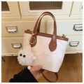 Cream white bucket bag with brown handles and decorative butterfly patterns - With Pendant Style / Off White