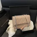 Elegant beige quilted flap crossbody bag with silver chain strap on silk fabric - Khaki