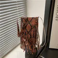 Chic snake print crossbody bag with long fringes and adjustable strap for women - Orange