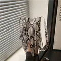 Snake pattern crossbody bag with long fringe and adjustable silver buckle strap - White