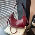Retro deep red crescent moon shoulder bag with glossy patent leather texture and slim strap - Red