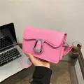 Pink fashion crossbody bag with U-shaped silver buckle and elegant leather texture - Pink