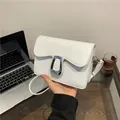 Minimalist white square crossbody bag with wavy flap and silver metal buckle - White
