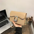 Minimalist square flap bag in light brown PU leather with a large silver metal buckle - Khaki