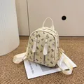 Mini cream backpack with cartoon bear patterns and double vertical zipper pockets - Off White