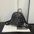 Mini black backpack with white cartoon bear print and double golden zippers - Black