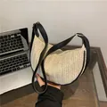 Woven crescent shoulder bag with cream straw texture and black leather strap detail - Off White