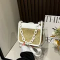 Straw and white leather patchwork crossbody bag with chain detail and wide strap - White