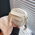 Minimalist ivory corduroy square crossbody bag with adjustable strap and braided details - White