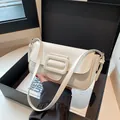 Elegant white matte PU leather underarm baguette bag in a premium black gift box - White