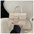 Creamy white leather handbag with a large square buckle and detachable shoulder strap - Khaki