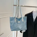 Borsa tote retrò in denim blu con manici argentati e etichetta metallica Fashion - Azzurro