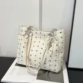 Chic off-white bow pattern tote bag with pearl pendant and stylish pleat texture - Beige With Pendant
