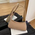 Hellbraune Unterachseltasche aus PU-Leder mit metallischer Schleifenverzierung - Hellbeige