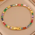 Bracelet tennis doré avec pierres multicolores aux coupes rondes et rectangulaires - Coloré