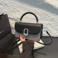 Minimalist black and gray patchwork handbag with silver clasp and top handle for women - Black
