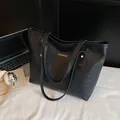 Black large capacity tote bag with embossed letters and fashion metal plaque for women - Black