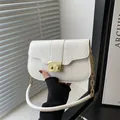 White faux crocodile texture crossbody bag with gold chain strap and metal lock - White