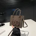 Retro square handbag with G-letter logo and geometric prints in dark brown - Brown
