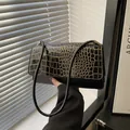 Chic black leather shoulder bag with gold crocodile texture flap for women - Black