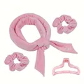 Detail of pink velvet heatless hair curler set with two scrunchies and a claw clip - Pink