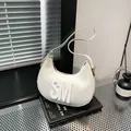Minimalist white crescent shoulder bag with 3D SM logo and textured synthetic leather - White