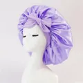 Detail of purple satin bonnet featuring a large bow on a white mannequin head - Medium / New Purple