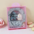 Set fascia e polsini in peluche grigio con molletta per capelli a fiore in pacchetto - Grigio Chiaro (Motivo Frangipane)