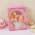 Set fascia e polsini in spugna rosa con molletta a fiore in confezione regalo - Arancio Chiaro (Motivo Frangipane)