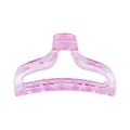Detail of pink translucent hair claw clip with wavy design and smooth resin finish - Clear / Fairy Pink