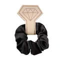 Detail of a large black satin scrunchie on a diamond-shaped pink retail display card - Black