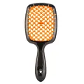 Schwarze und orangefarbene hohle Wabenhaarbürste mit flexiblen Borsten zum Entwirren - Orange-Schwarzer Griff