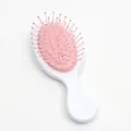 Tragbare pink-weiße Mini-Luftkissenbürste mit Massageborsten für die Kopfhautpflege - Glänzend Weiß