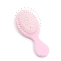 Tragbare rosa Mini-Luftkissen-Haarbürste mit weißen Borsten für die Kopfmassage - Meerjungfrau Perlmuttrosa