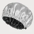 Detail of double-layer satin sleep cap showing silver outer fabric and black inner lining - Adjustable / Gray And Black Lining