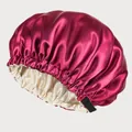 Detail of double-layered satin hair bonnet with adjustable buckle and shiny silk texture - Adjustable / Wine Red And Beige Lining