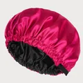 Detail of double-layered satin hair bonnet showing rose red exterior and black silk lining - Rose Red + Black
