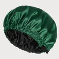Detail of the double-layered satin hair bonnet showing the dark green silk texture and elastic band - Adjustable / Dark Green And Black Lining