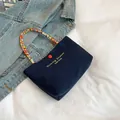 Vintage navy canvas tote bag with bohemian colorful beaded handle and gold lettering - Blue