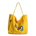 Sac fourre-tout en toile jaune avec imprimé bleu et étiquette latérale mode minimaliste - Jaune
