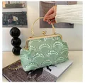 Detail of light green lace sequin evening bag with gold metal ring handle and chain - Green