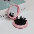 Brosse à cheveux pliable avec miroir rose clair, compacte pour le maquillage quotidien - Coque Rose Coussin Noir Poils Noirs