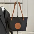 Minimalist black tote bag with brown leather straps and fashion circular logo patch - Large / Black Large Without Pendant