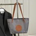 Grey nylon tote bag with brown leather patch and shoulder straps for daily use - Large / Dark Gray Large No Charm
