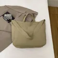 Minimalist large khaki tote bag with wide straps for casual urban commuting and shopping - Khaki