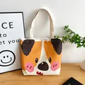 White canvas tote bag with a cute cartoon dog print for students and daily commuting - Orange