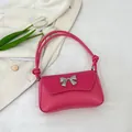 Rose pink shoulder bag with woven texture, silver bow detail, and knotted leather straps - Rose Red